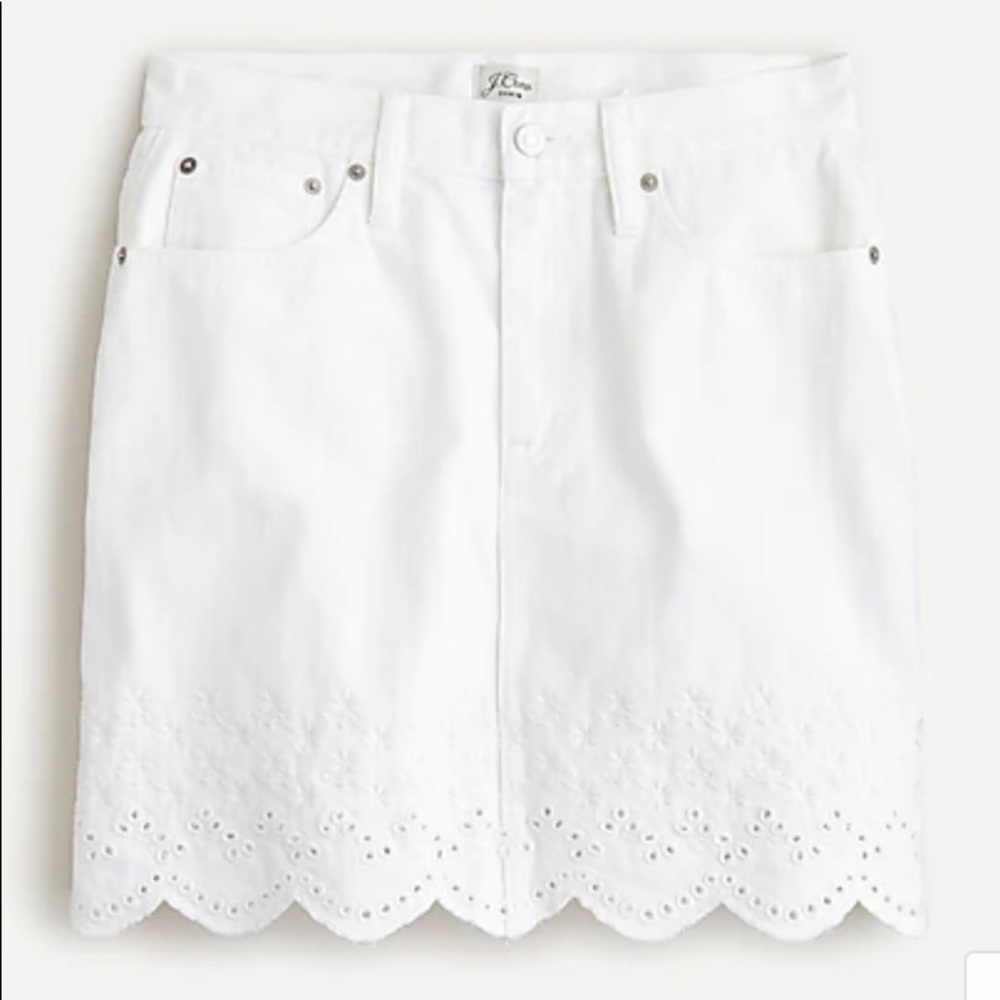 Denim mini skirt with eyelet hem